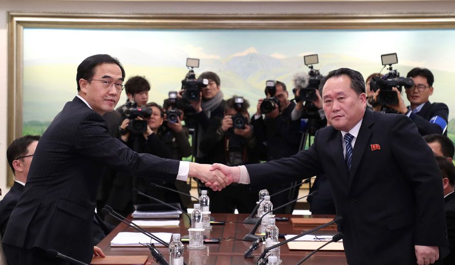 2018/01/1_9_2018_south-korea-koreas-tensi-288201_c0-0-5000-2915_s885x5163453_1515574784.jpg